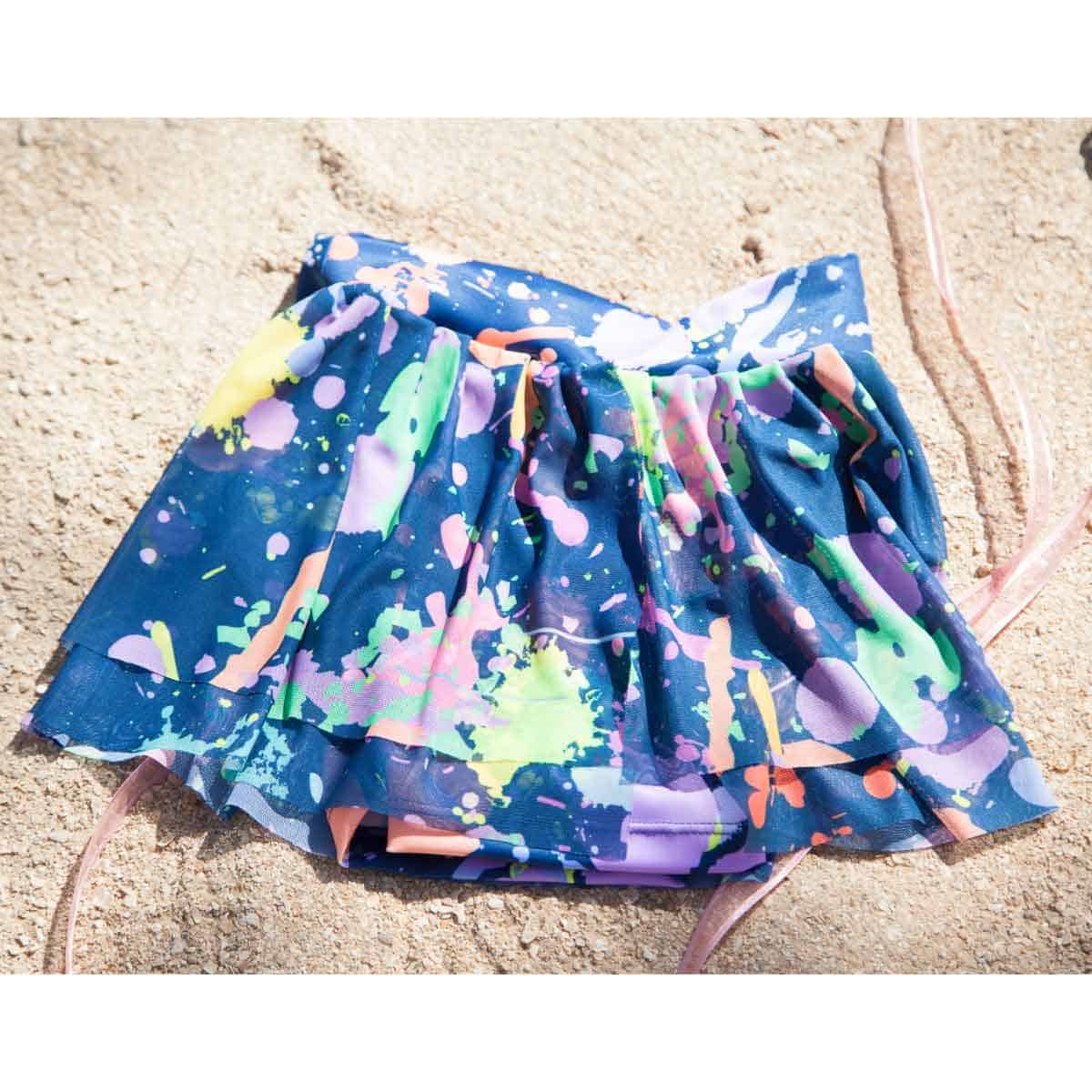 FALDA SHORT DE TENIS SPLASH PAINT PARA NIÑAS-DREAM